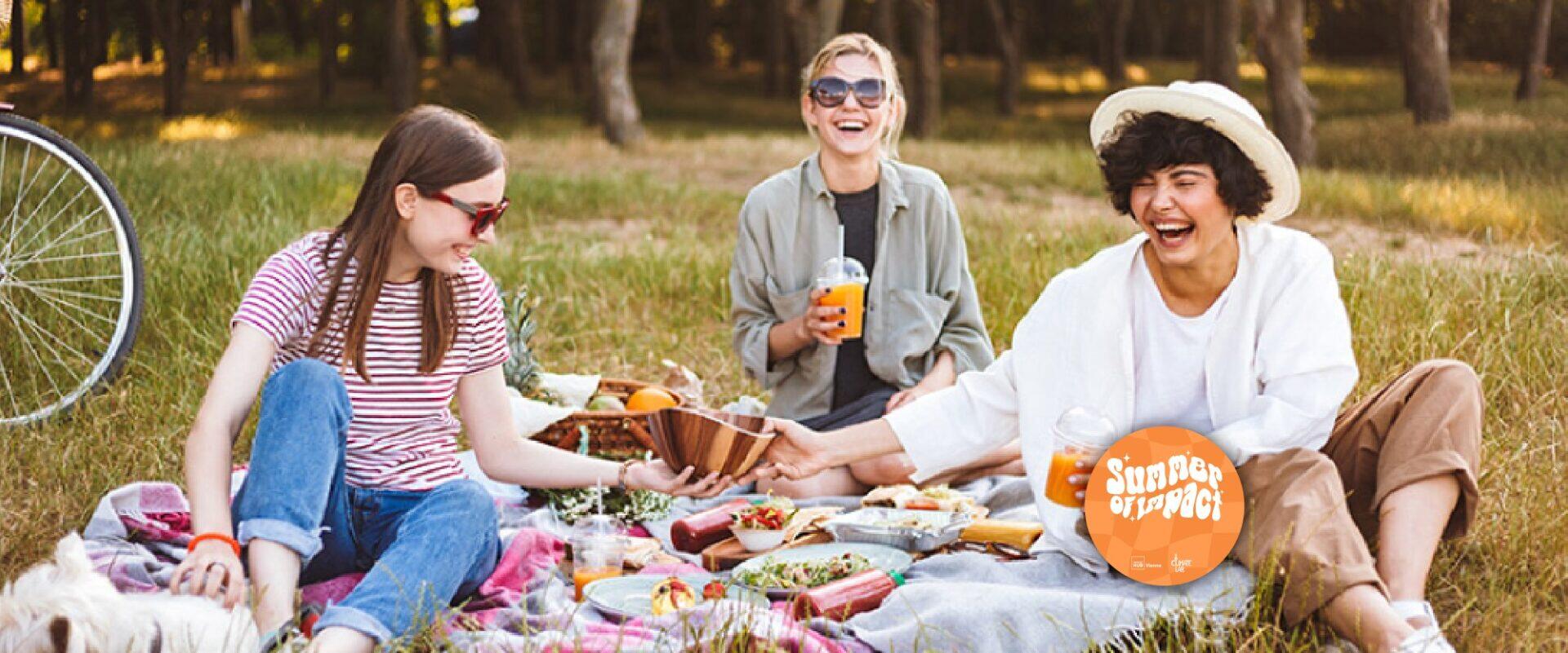 Drei Frauen bei einem Picknick im Park